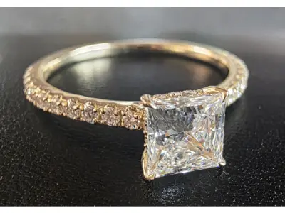 Gouden ring met 1 crt Prinsess diamant ( IGI ) – kavel bij XL Auctions