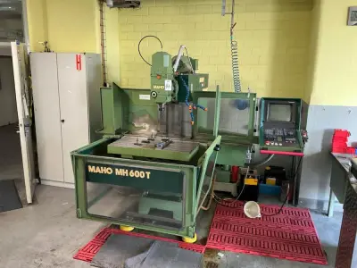 1987 MAHO MH 600 T CNC milling machine – kavel bij Dome Auctions, Neuss