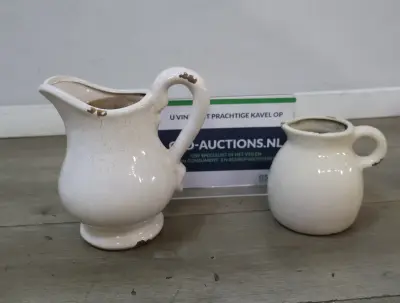 Brocante witte keramische kannen – kavel bij GSD Auctions, Zoeterwoude