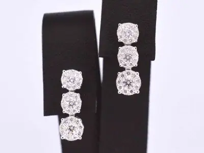 Oorhangers met drie chatons van diamanten – kavel bij Onlineveilingmeester