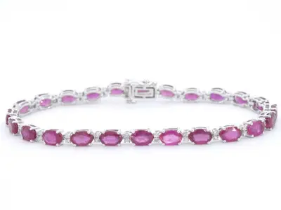 Witgouden tennisarmband met diamanten en robijn – kavel bij Onlineveilingmeester