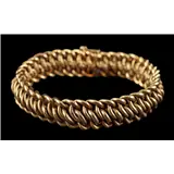 Gouden fantasie schakelarmband,14-krt., met gegraveerde middenschakels,18,5 cm, 27 gram – kavel bij Veilinghuis Derksen