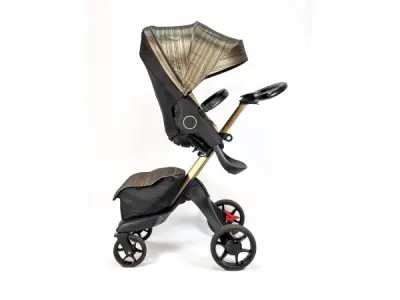 Stokke XPLORY X Ltd. Gold Black COG - Luxe kinderwagen – kavel bij XL Auctions
