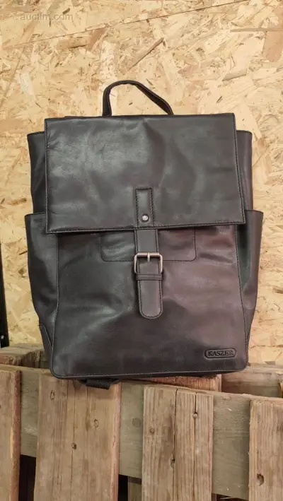 leder tas – kavel bij Auctim, Balen
