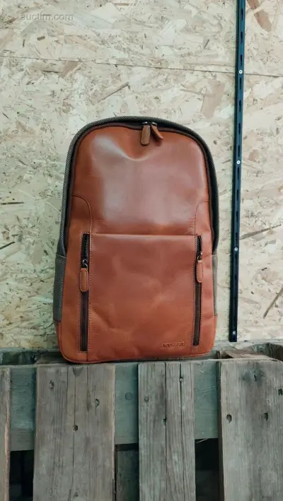 leder tas – kavel bij Auctim, Balen