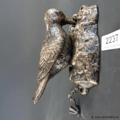 Vogel als deurklopper – kavel bij ProVeiling