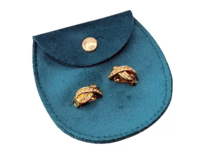 Christian Dior | Vintage Strass Crossover Clips – kavel bij XL Auctions