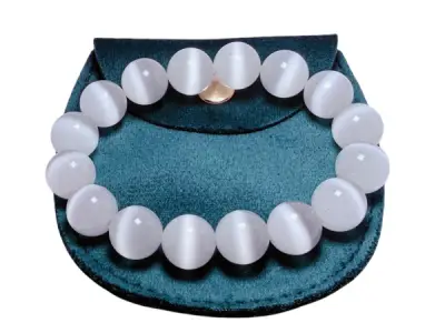 Roze 'Cat's Eye' Armband – kavel bij XL Auctions