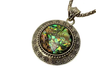3-delige sieradenset met iriserende abalone – kavel bij XL Auctions