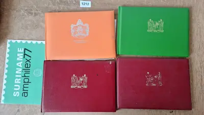 Set Suriname Amphilex 77: Vier kleine albums en een herdenkingsvel – kavel bij Goeiendeal