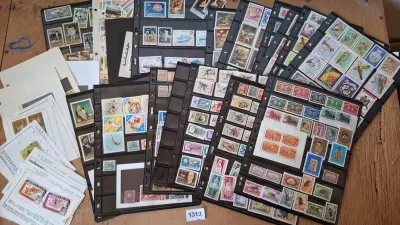 Verzameling postzegels op insteekbladen en losse bladen, diverse landen en thema's – kavel bij Goeiendeal