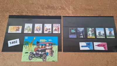 Losse postzegels Kuifje en stripfiguren met postzegelblok Democratische Republiek Congo en diverse Europese molen-en natuurzegels – kavel bij Goeiendeal