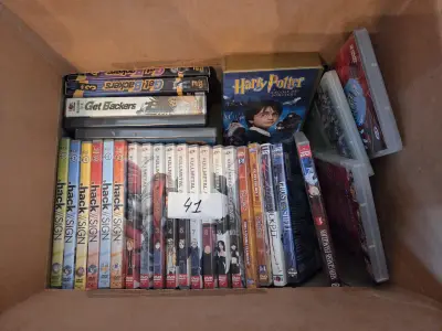 Kartonnen doos gevuld met een verzameling dvd's waaronder Harry Potter, Ghost in the Shell en .hack//SIGN lot 41 – kavel bij Goeiendeal, Jette
