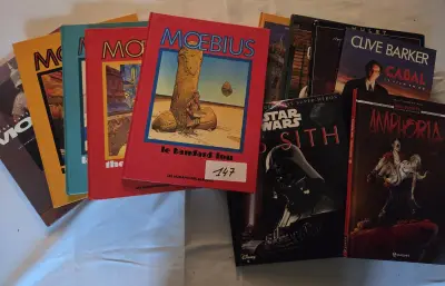 Stapel diverse graphic novels en stripboeken van Moebius (onder andere Le bandard fou), Star Wars Sith, Clive Barker Cabal en Amphoria – Lot 147 – kavel bij Goeiendeal, Jette