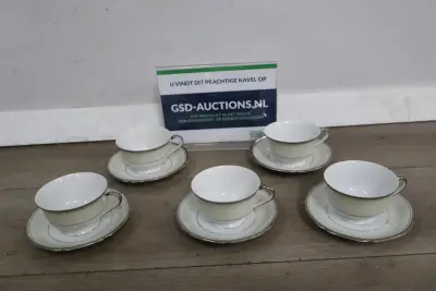 Set porseleinen kop en schotels' – kavel bij GSD Auctions, Zoeterwoude