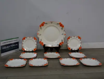 Serviesset met oranje bloemendecoratie – kavel bij GSD Auctions, Zoeterwoude