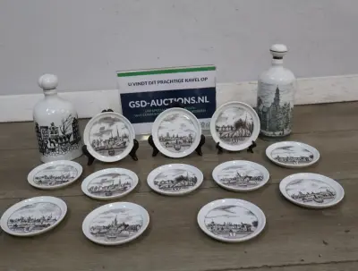 Keramiek met Nederlandse stadsgezichten – kavel bij GSD Auctions, Zoeterwoude