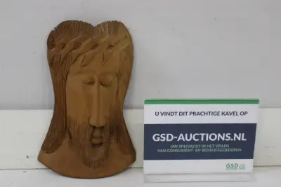 Houten wandsculptuur van een gezicht – kavel bij GSD Auctions, Zoeterwoude