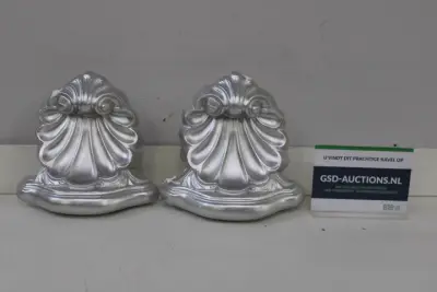 Set van 2 zilverkleurige wanddecoraties in schelpmotief – kavel bij GSD Auctions, Zoeterwoude