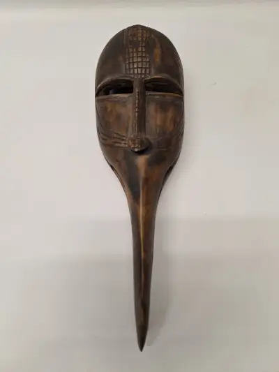 Afrikaans houten vogelmasker met dubbele snavel – kavel bij De Kringwinkel, Gent