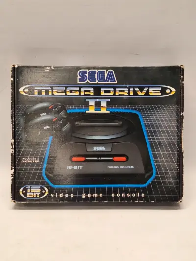 SEGA Mega Drive II - spelconsole met 2 controllers - in de originele doos – kavel bij De Kringwinkel, Gent