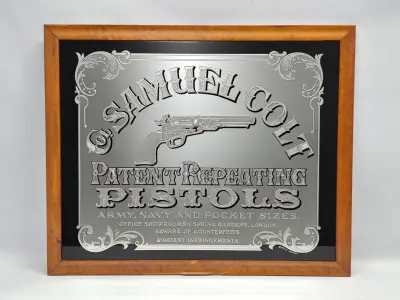 Vintage reclamespiegel "Samuel Colt Patent Repeating Pistols" - pubspiegel in houten lijst – kavel bij De Kringwinkel, Gent