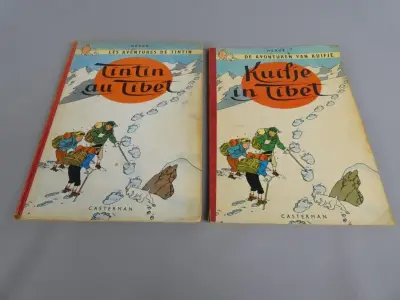 Twee exemplaren van "Kuifje in Tibet" (Frans en Nederlands) – kavel bij De Kringwinkel, Diest