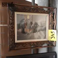 Fotokader houtsnijwerk – kavel bij BOPA Auctions, Hooglede