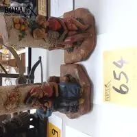 Koppel boekensteunen – kavel bij BOPA Auctions, Hooglede