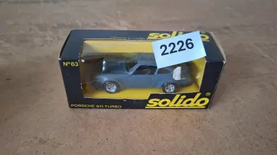 Modelauto Porsche 911 Turbo N° 63 - Solido – kavel bij Goeiendeal
