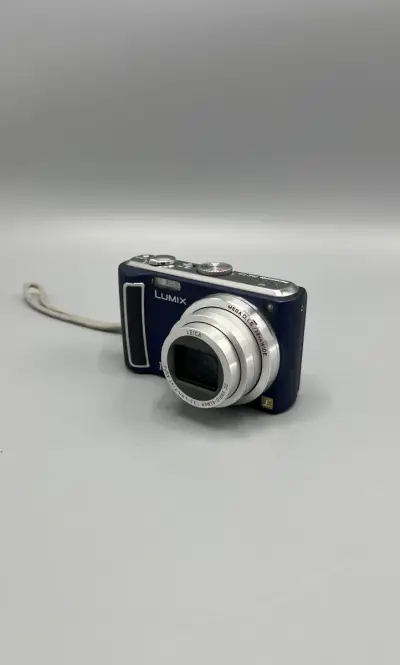 Digitale compactcamera Panasonic Lumix DMC-TZ5 met Leica 10x zoom en accessoires – kavel bij De Kringwinkel, Oostkamp