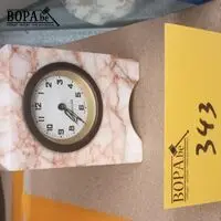 Klok in marmer – kavel bij BOPA Auctions, Tielt