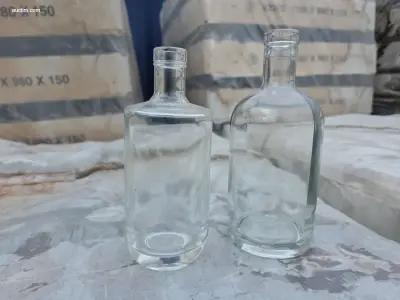 12 palletten diverse glazen flessen Saverglass – kavel bij Auctim, Fexhe Le Haut Clocher
