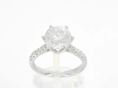 Gouden diamanten solitair ring met een grote diamant van 3.00 carat en kleine diamanten – kavel bij Onlineveilingmeester
