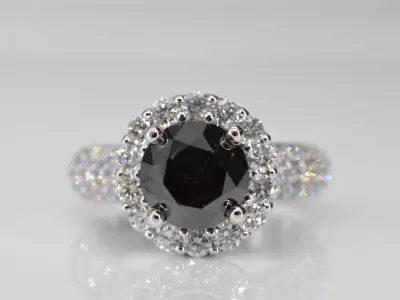 Witgouden entourage ring met grote diamanten en een zwarte diamant – kavel bij Onlineveilingmeester