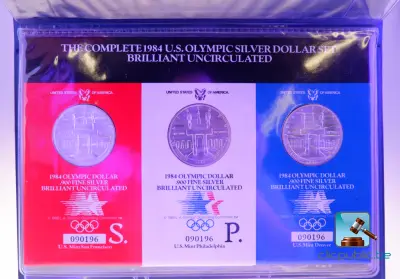 Set met zilveren Olympische herdenkingsdollars – kavel bij Clicpublic, Nivelles