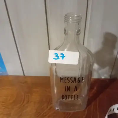 Decoratieve fles met de opdruk "Message in a bottle" (Lot: 37) – kavel bij Goeiendeal, Lommel