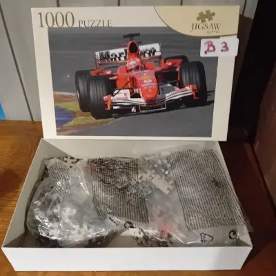 Legpuzzel van een Formule 1-wagen met 1000 stukjes, merk Jigsaw by PTZ (Lot: B 3) – kavel bij Goeiendeal, Lommel