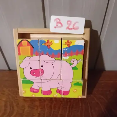 9-delige houten blokpuzzel met boerderijdieren in een houten bewaardoos, merk Bigjigs (Lot: B 26) – kavel bij Goeiendeal, Lommel