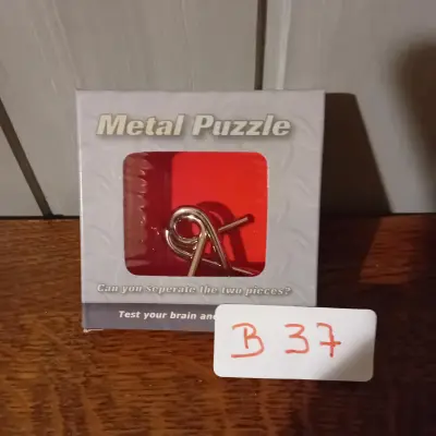 Metalen hersenbreker / Metal Puzzle in originele verpakking (Lot: B 37) – kavel bij Goeiendeal, Lommel