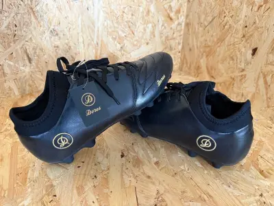 Voetbalschoenen - paar Dores – kavel bij Onlineveilingmeester