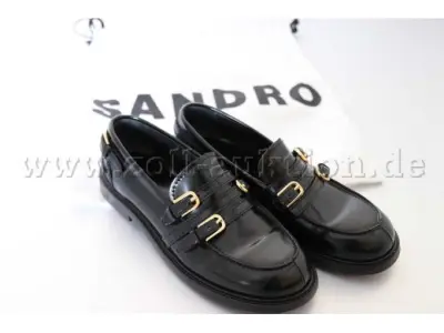 1 paar damesschoenen van Sandro: mocassins met gespen, maat 37 – kavel bij Zoll-Auktion, Freiburg im Breisgau