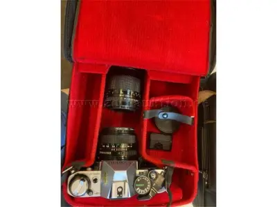 1 Canon AE-1 analoge spiegelreflexcamera – kavel bij Zoll-Auktion, Freiburg im Breisgau