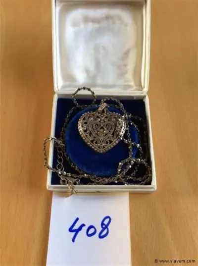 Ketting met hartvorm – kavel bij Vlavem