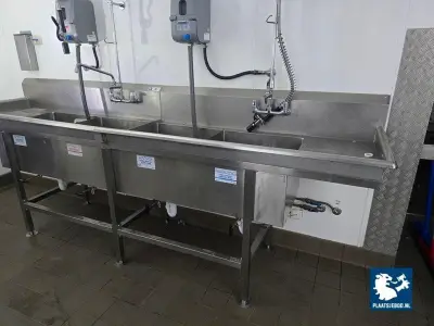 1 x RVS dubbele spoeltafel met 2 x dubbele spoelbak, 2 x mengkraan met handdouche en 2 x zeepdoseerinstallatie – kavel bij Plaats Je Bod, Rotterdam