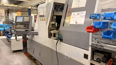 CNC-Langdrehmaschine mit Stangenlader WIVIA W428 – kavel bij IVG, Mahlstetten