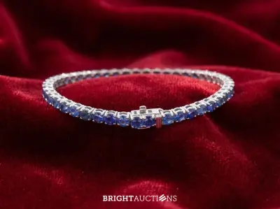 Witgouden tennisarmband met natuurlijke saffieren – kavel bij Bright Auctions, Netherlands