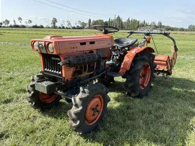 Zen-Noh B7001 oldtimer vierwielaangedreven minitractor met grondfrees – kavel bij Dome Auctions, Middelkerke