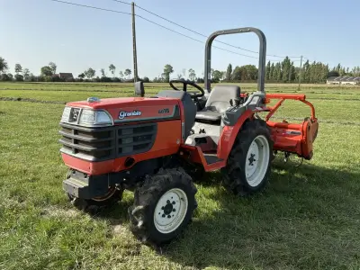 1992 Kubota Granbia GB18(F) vierwielaangedreven minitractor met grondfrees – kavel bij Dome Auctions, Middelkerke