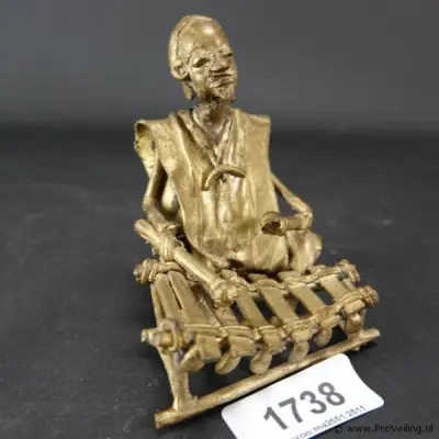 Afrikaanse bronzen Balafon speler – kavel bij ProVeiling